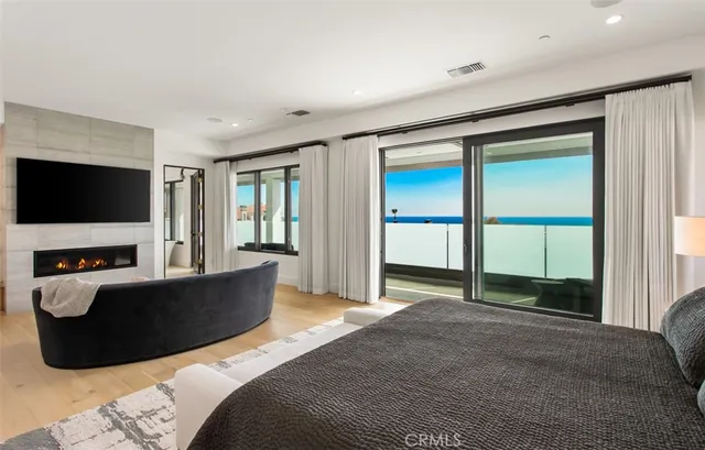 a living room with a flat screen tv and a couch