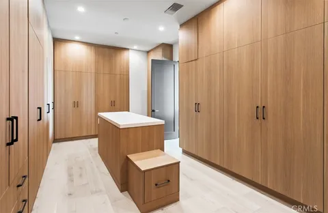 a bathroom with a sink a mirror and a shower