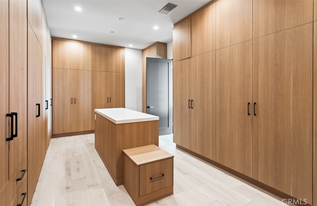 75 Ritz Cove Drive Dana Point, CA 92629 - Photo 33 of 49 a bathroom with a sink a mirror and a shower