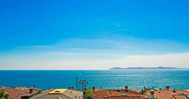 a view of a balcony with chairs