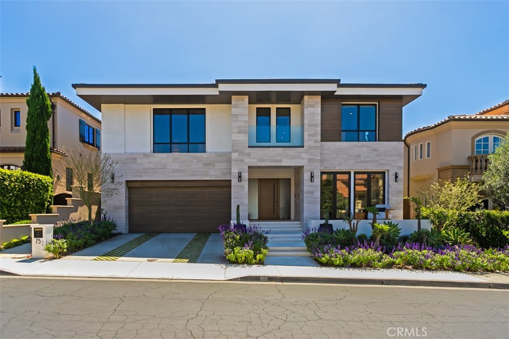 75 Ritz Cove Drive Dana Point, CA 92629 - Photo 8 of 49 a front view of house with yard