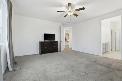 a view of a park with swings and slides