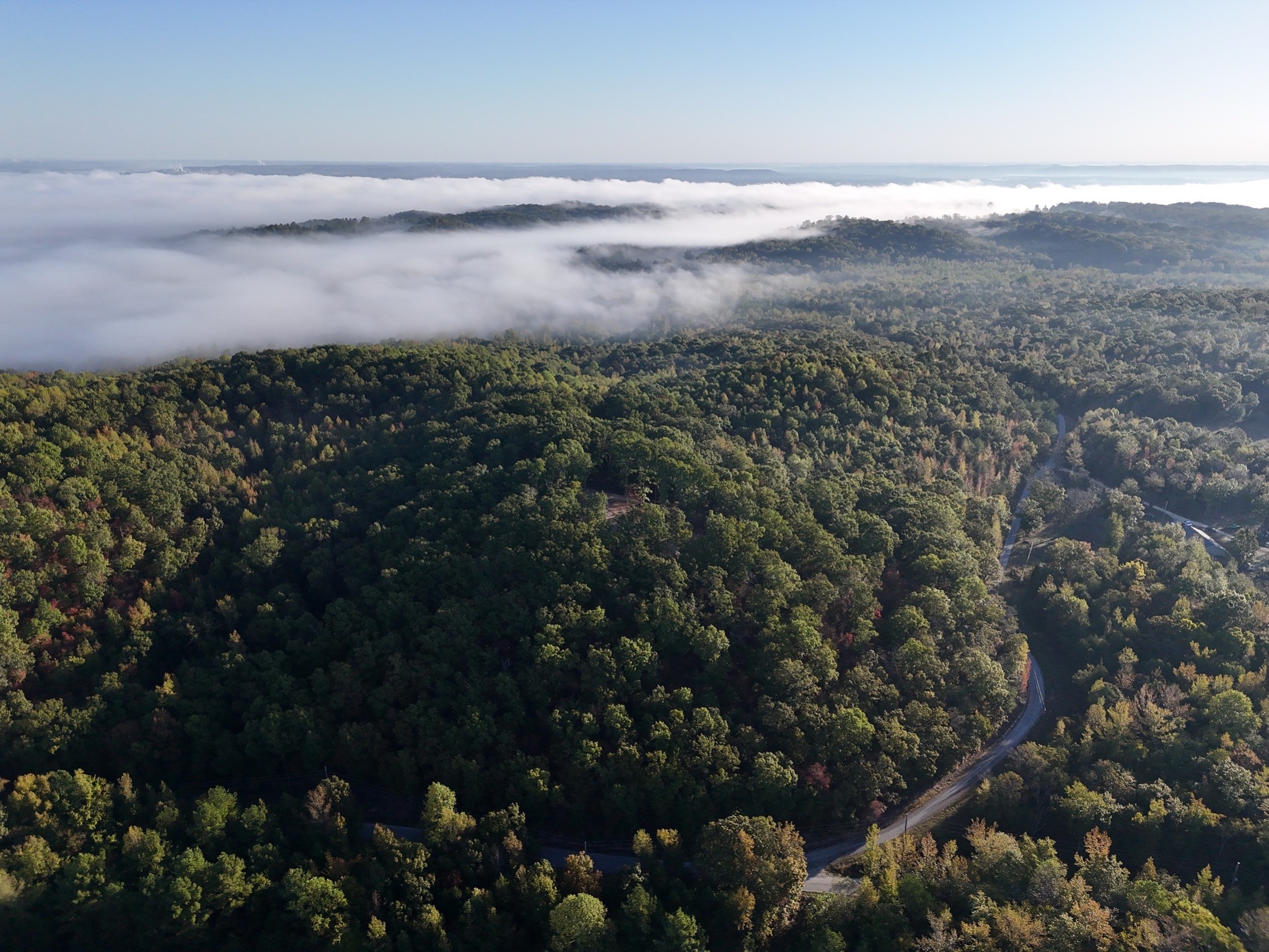 0 Coxburg Road South Holladay, TN 38341 - Photo 15 of 15 a view of an outdoor space and mountain from inside of a building