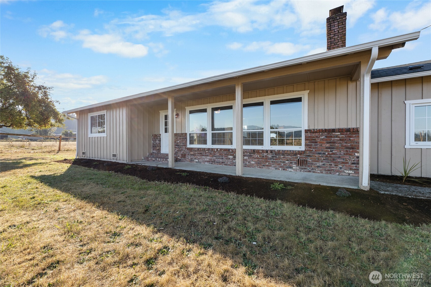 18008 202nd Street East Orting, WA 98360 - Photo 25 of 35 a view of a house with backyard and garden