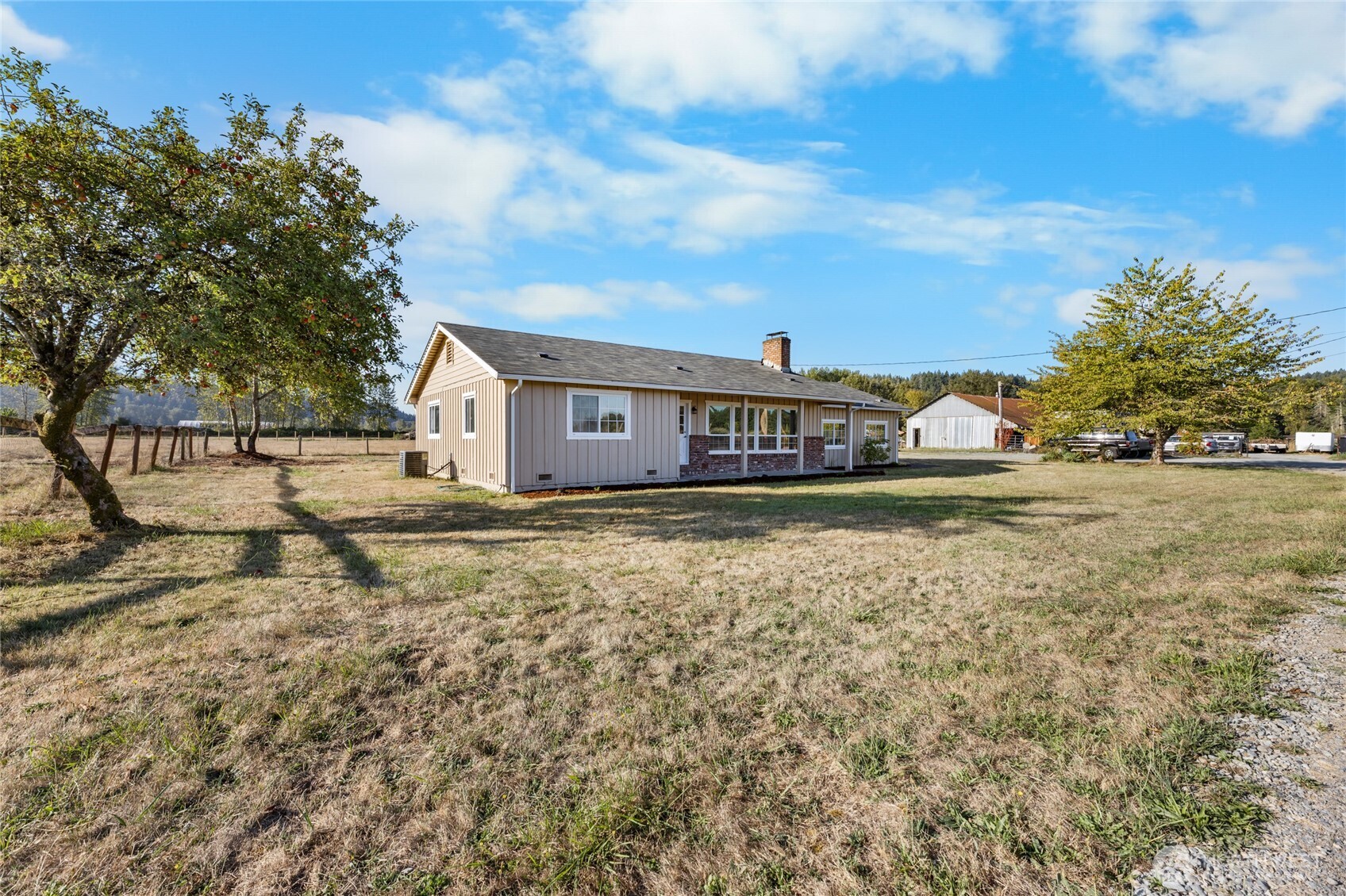 18008 202nd Street East Orting, WA 98360 - Photo 27 of 35 a view of house with yard and sitting area