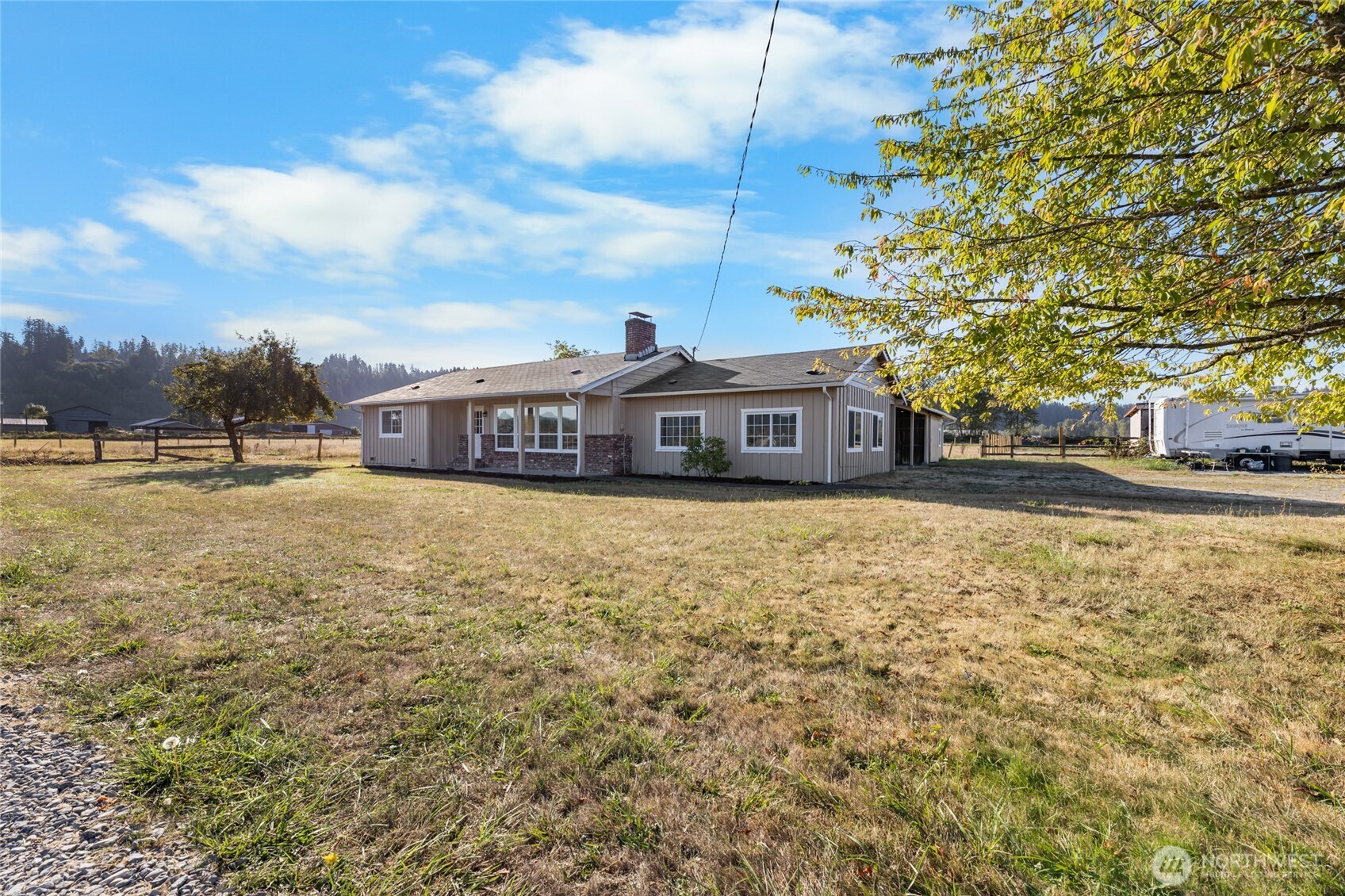 18008 202nd Street East Orting, WA 98360 - Photo 28 of 35 a front view of a house with a yard
