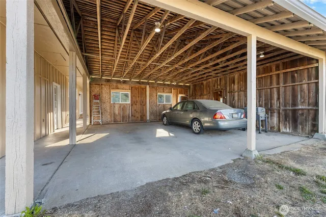 a view of a cars parked in front of a house