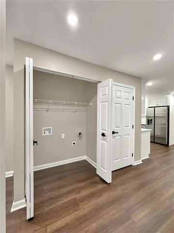 a view of a livingroom with wooden floor