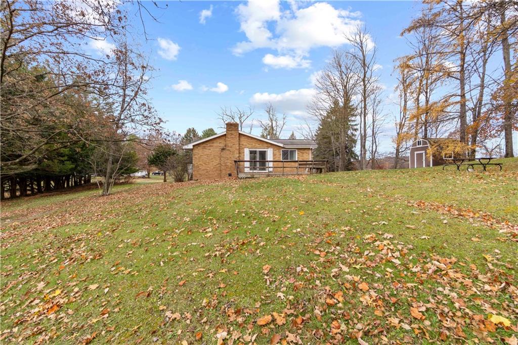 461 Eicher Road Pittsburgh, PA 15237 - Photo 5 of 28 a view of a yard with a large tree