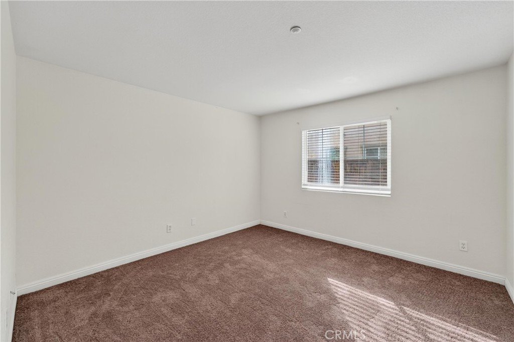 9406 Kentfield Court Riverside, CA 92508 - Photo 25 of 64 Large downstairs bedroom perfect for guests or multigenerational living