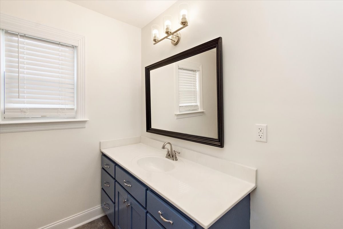 183 Gilliam Lane Tullahoma, TN 37388 - Photo 17 of 28 a bathroom with a sink vanity and a mirror