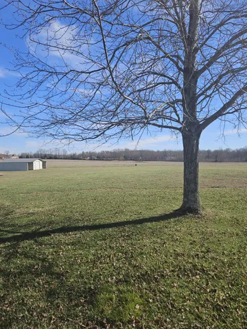 a view of a house with a big yard