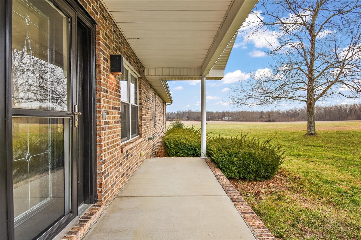 183 Gilliam Lane Tullahoma, TN 37388 - Photo 3 of 28 a view of porch with a garden