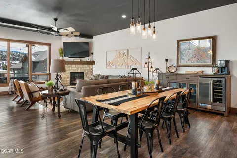 a kitchen with lots of counter top space a sink appliances and cabinets