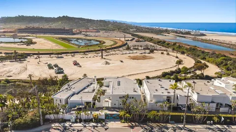 a view of a city with a lake