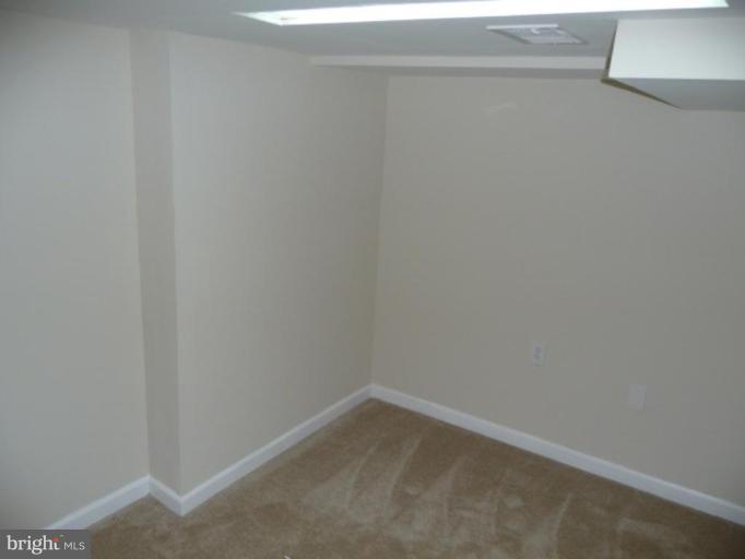 4502 Morgan Road Suitland, MD 20746 - Photo 5 of 14 a room that has a window in it