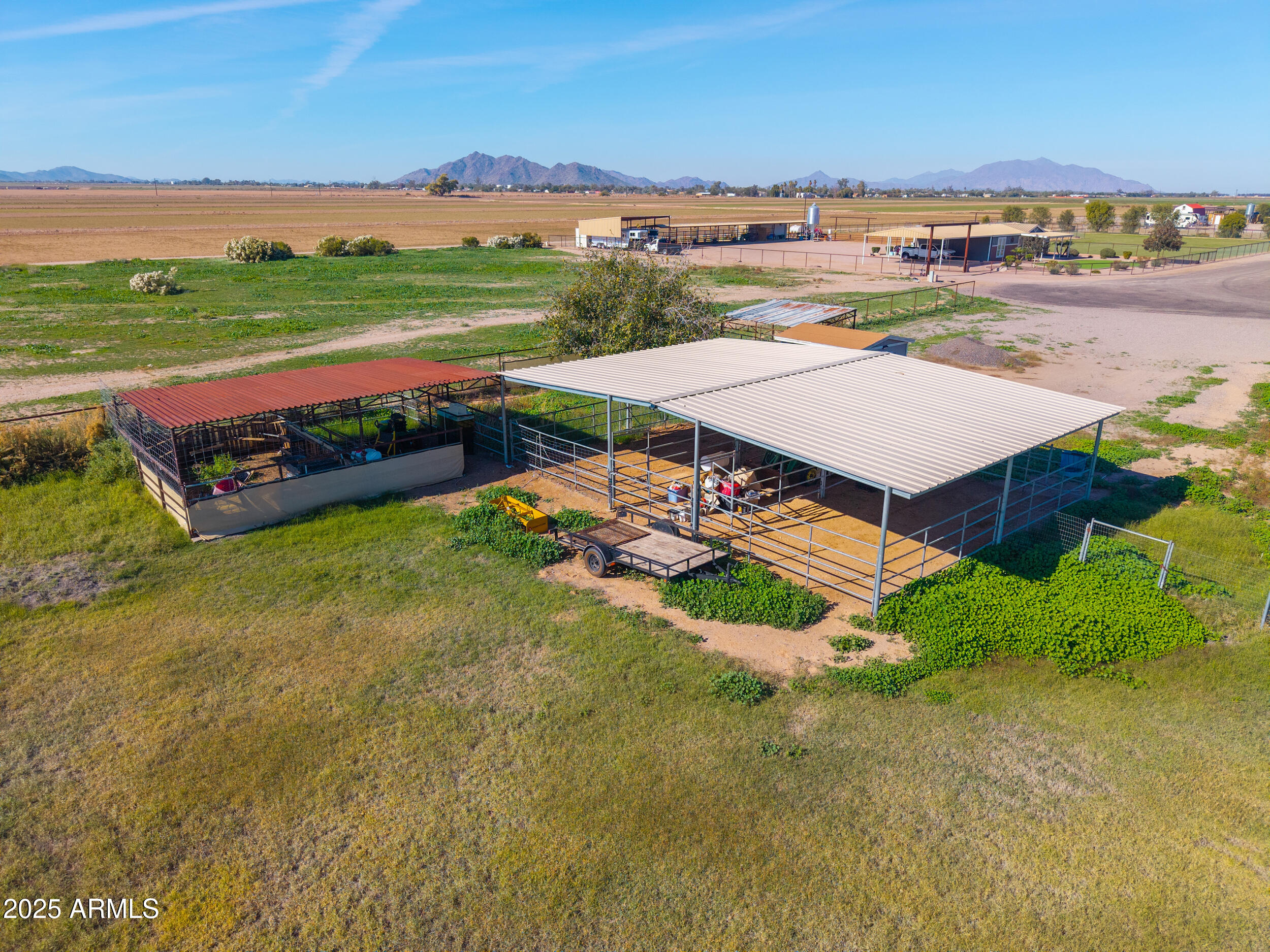 48217 West Quail Run Road, Unit 8 Maricopa, AZ 85139 - Photo 11 of 33 an aerial view of a house with garden space and outdoor space