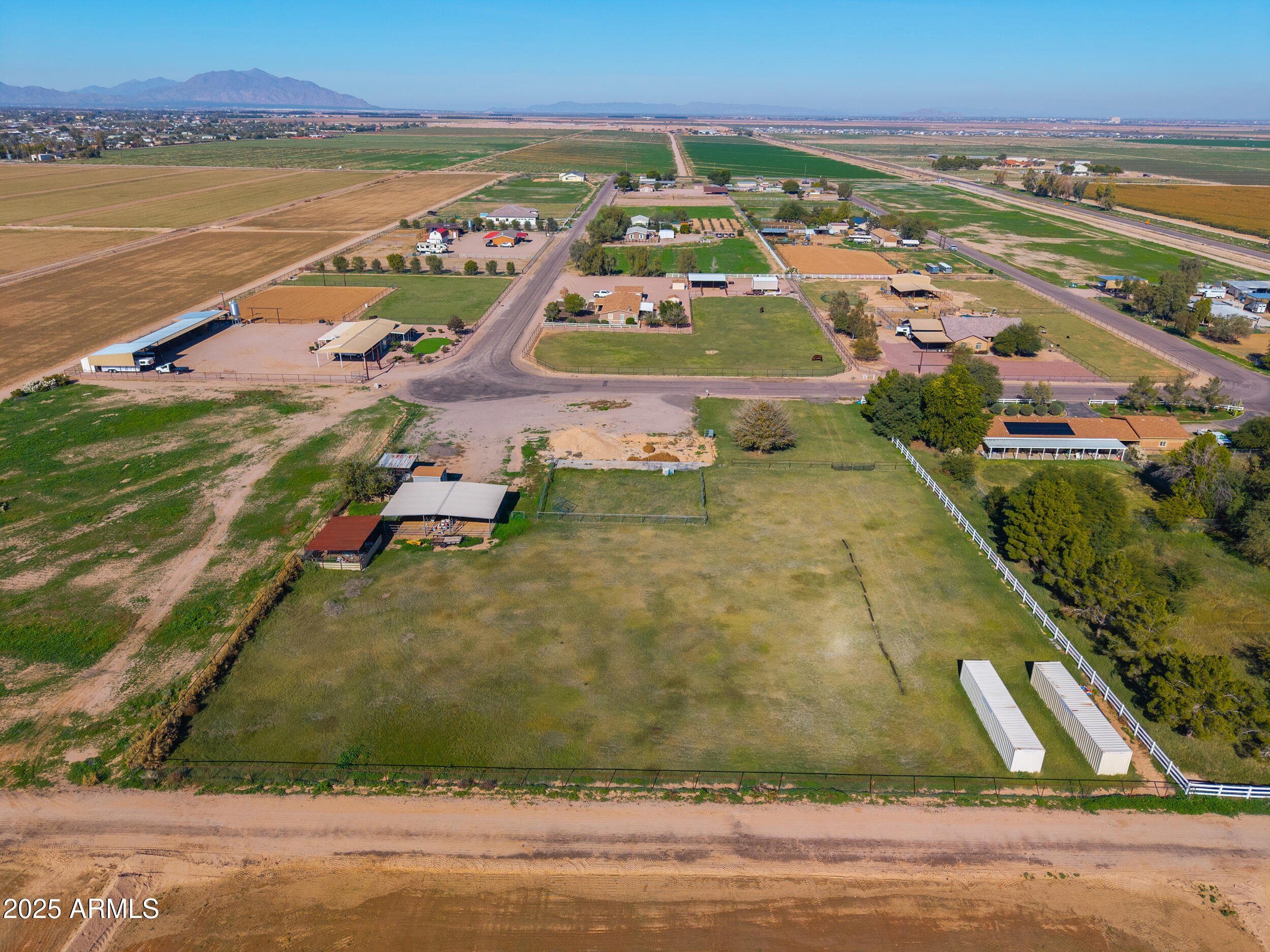 48217 West Quail Run Road, Unit 8 Maricopa, AZ 85139 - Photo 5 of 33 an aerial view of residential houses with outdoor space