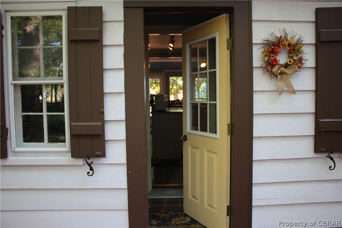 331 Thurston Road Mathews, VA 23109 - Photo 8 of 50 a view of a entryway door front of house