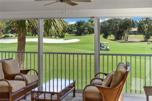 a view of a two chairs in the deck