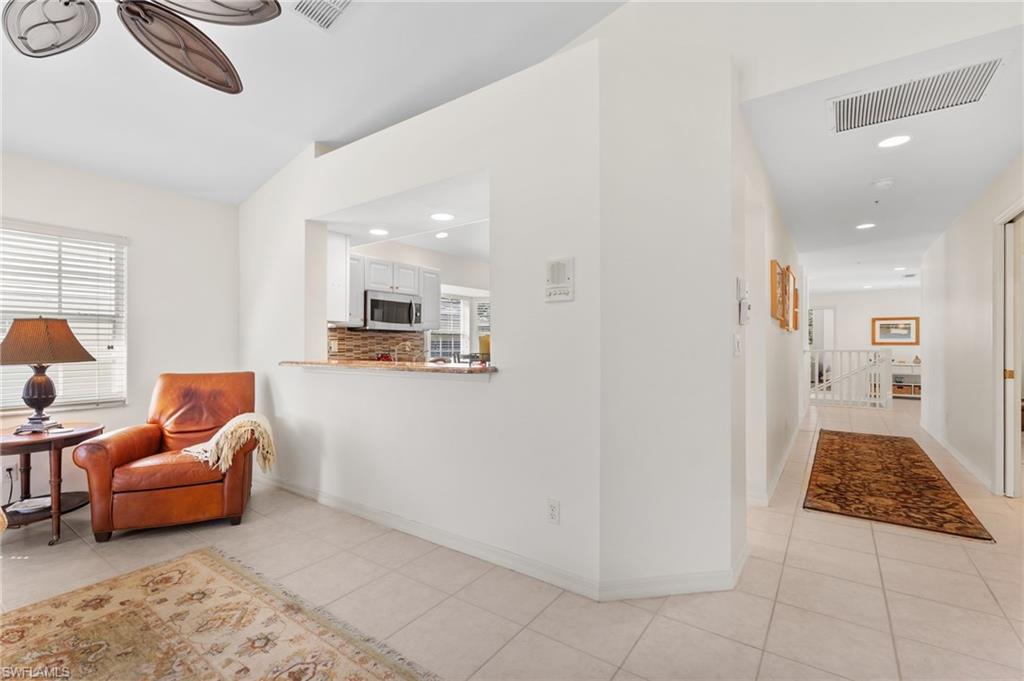 8500 Mystic Greens Way, Unit 506 Naples, FL 34113 - Photo 11 of 48 a living room with furniture