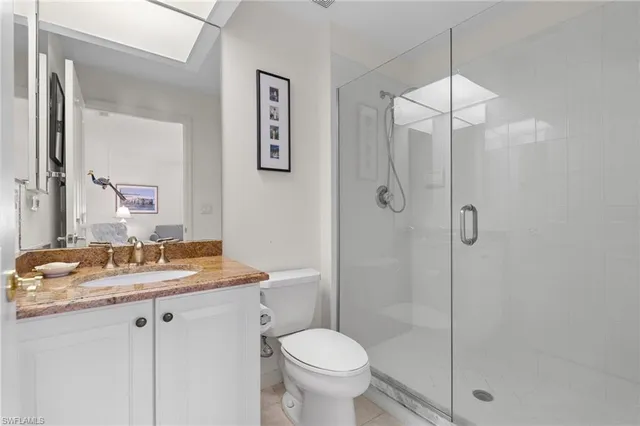 a utility room with sink dryer and washer