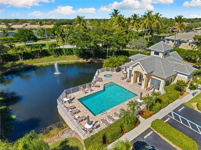 a view of a lake with a yard