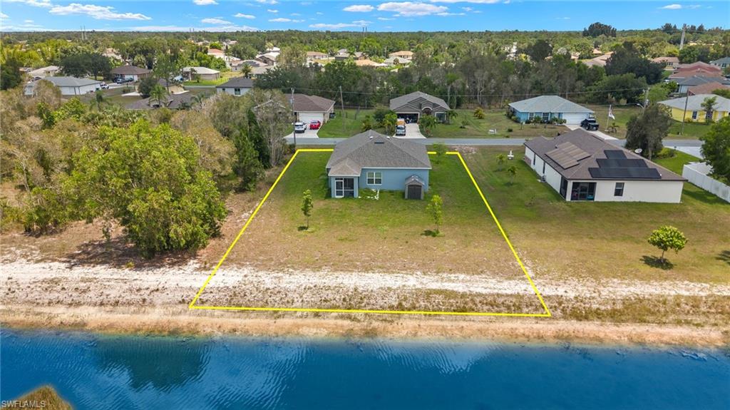 858 Rue Labeau Circle Fort Myers, FL 33913 - Photo 16 of 19 Drone / aerial view featuring a water view
