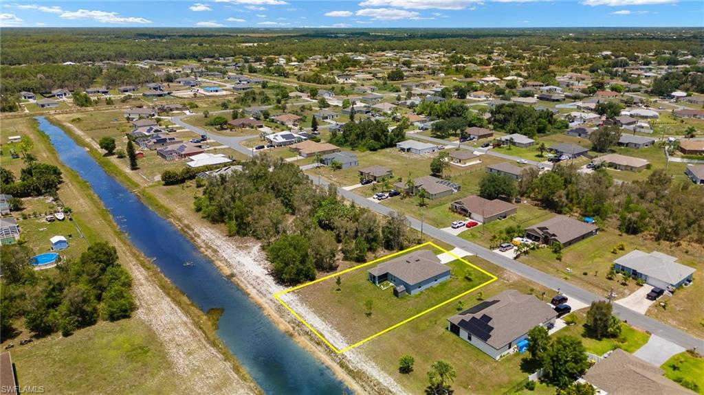 858 Rue Labeau Circle Fort Myers, FL 33913 - Photo 18 of 19 Bird's eye view with a water view
