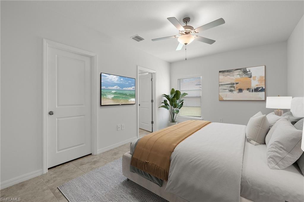 858 Rue Labeau Circle Fort Myers, FL 33913 - Photo 6 of 19 Tiled bedroom featuring multiple windows and ceiling fan