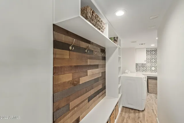 a long hallway with seating space