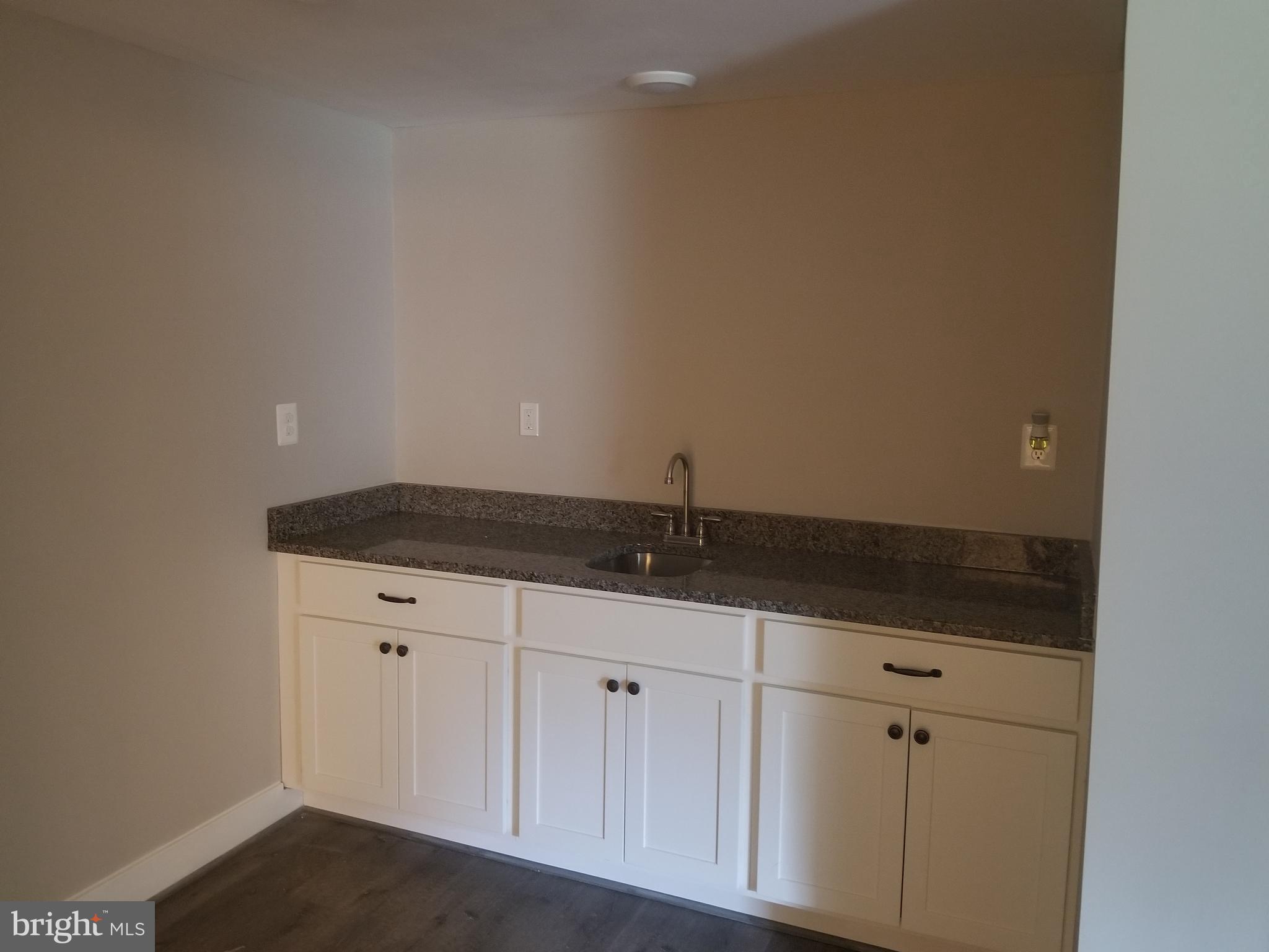 14520 Snake Castle Road Sumerduck, VA 22742 - Photo 12 of 21 Basement Wet Bar and Large Counter