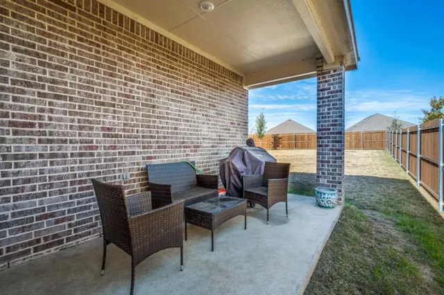 a bathroom with a shower and a mirror
