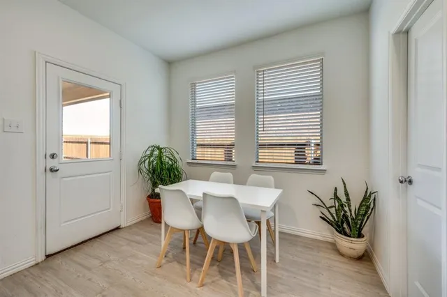 a kitchen with a sink stove and refrigerator