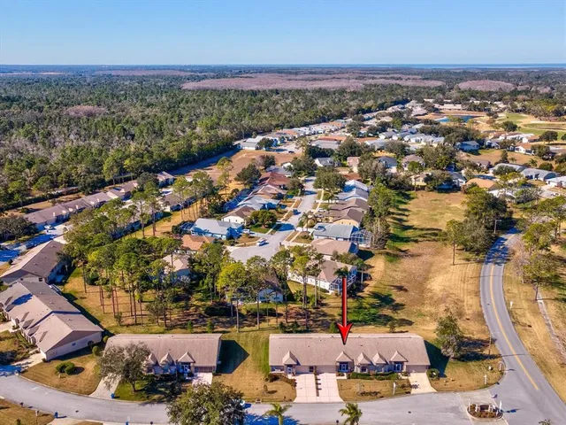 an aerial view of a city with lots of residential buildings