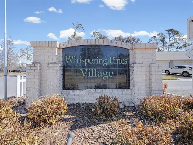 an aerial view of a house with outdoor space