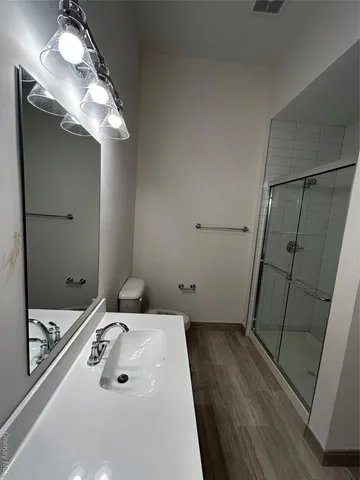 a bathroom with a sink and a mirror