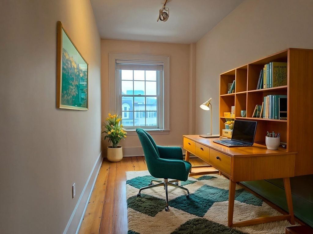 61 Otis Street, Unit 3 Cambridge, MA 02141 - Photo 4 of 18 a workspace with furniture and a window