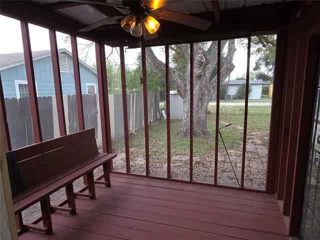 a view of room with furniture and wooden floor