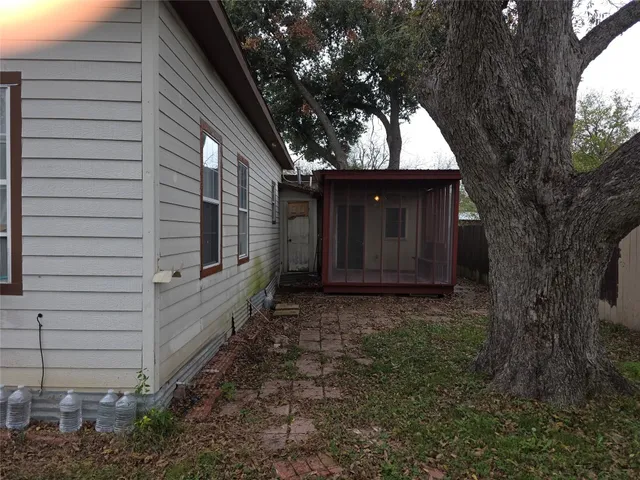 a house view with a backyard space