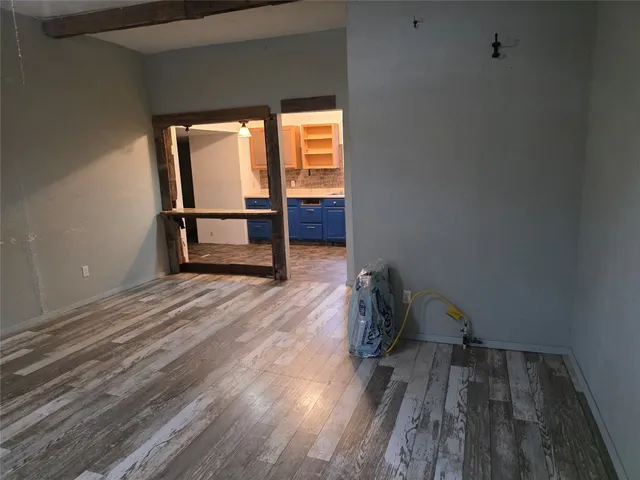 wooden floor and window in a room