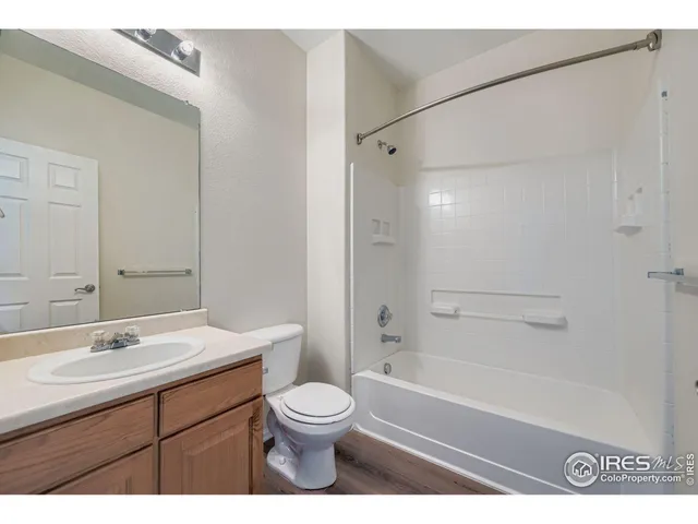 a bathroom with a sink a toilet and a bathtub