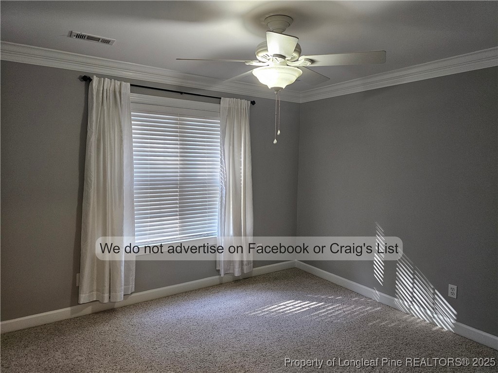 50 Barons Run East Spring Lake, NC 28390 - Photo 20 of 28 a view of a livingroom with a ceiling fan and window