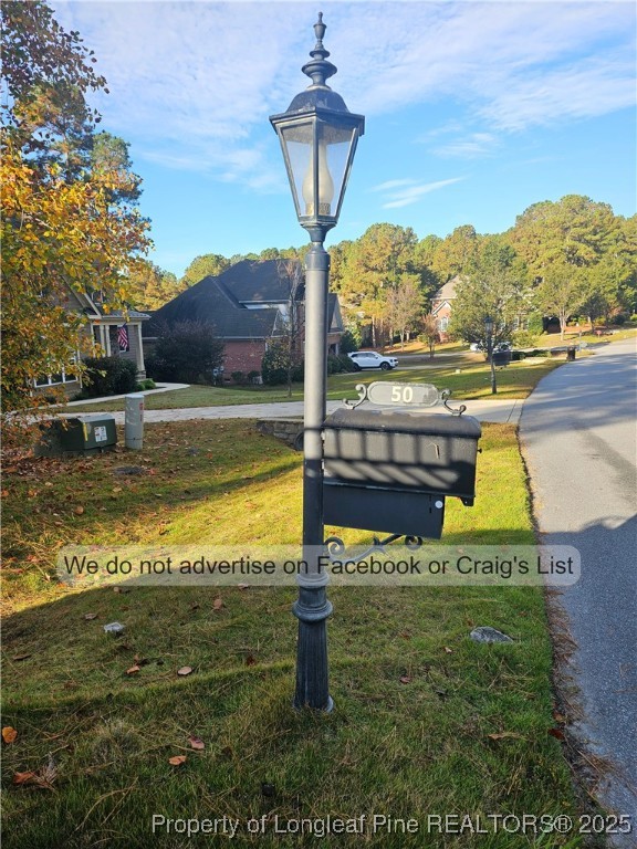 50 Barons Run East Spring Lake, NC 28390 - Photo 2 of 28 a view of a swimming pool with a yard