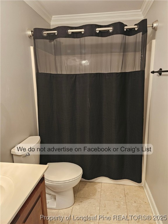 50 Barons Run East Spring Lake, NC 28390 - Photo 22 of 28 a bathroom with a toilet and a mirror