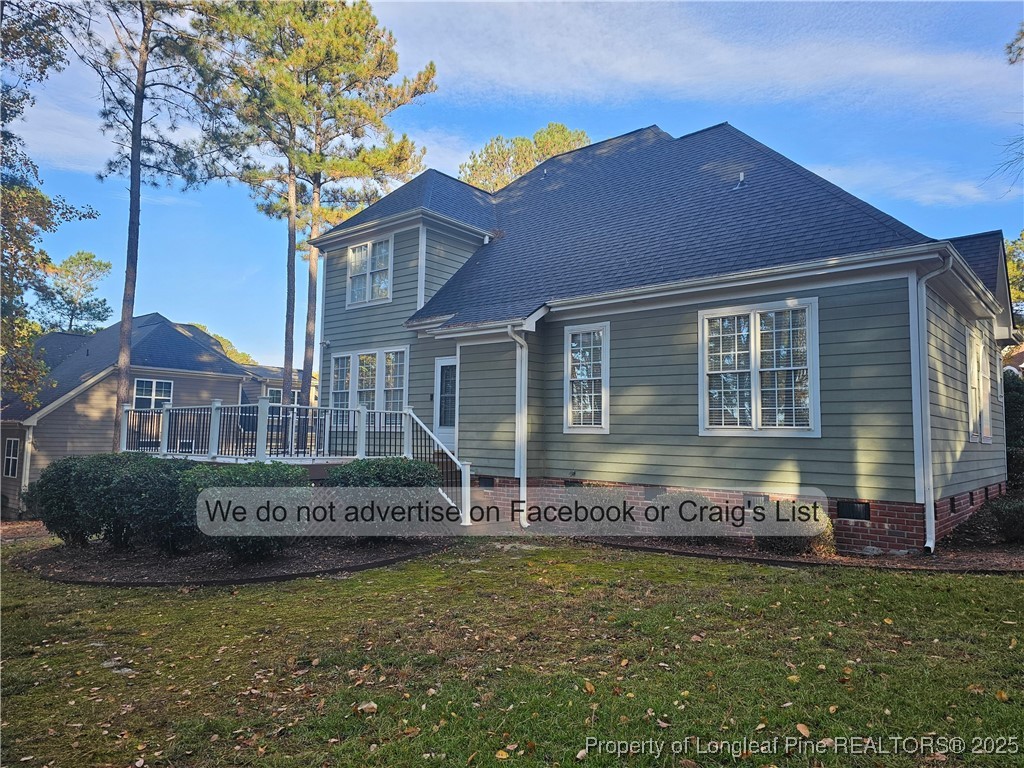 50 Barons Run East Spring Lake, NC 28390 - Photo 27 of 28 a front view of a house with a yard
