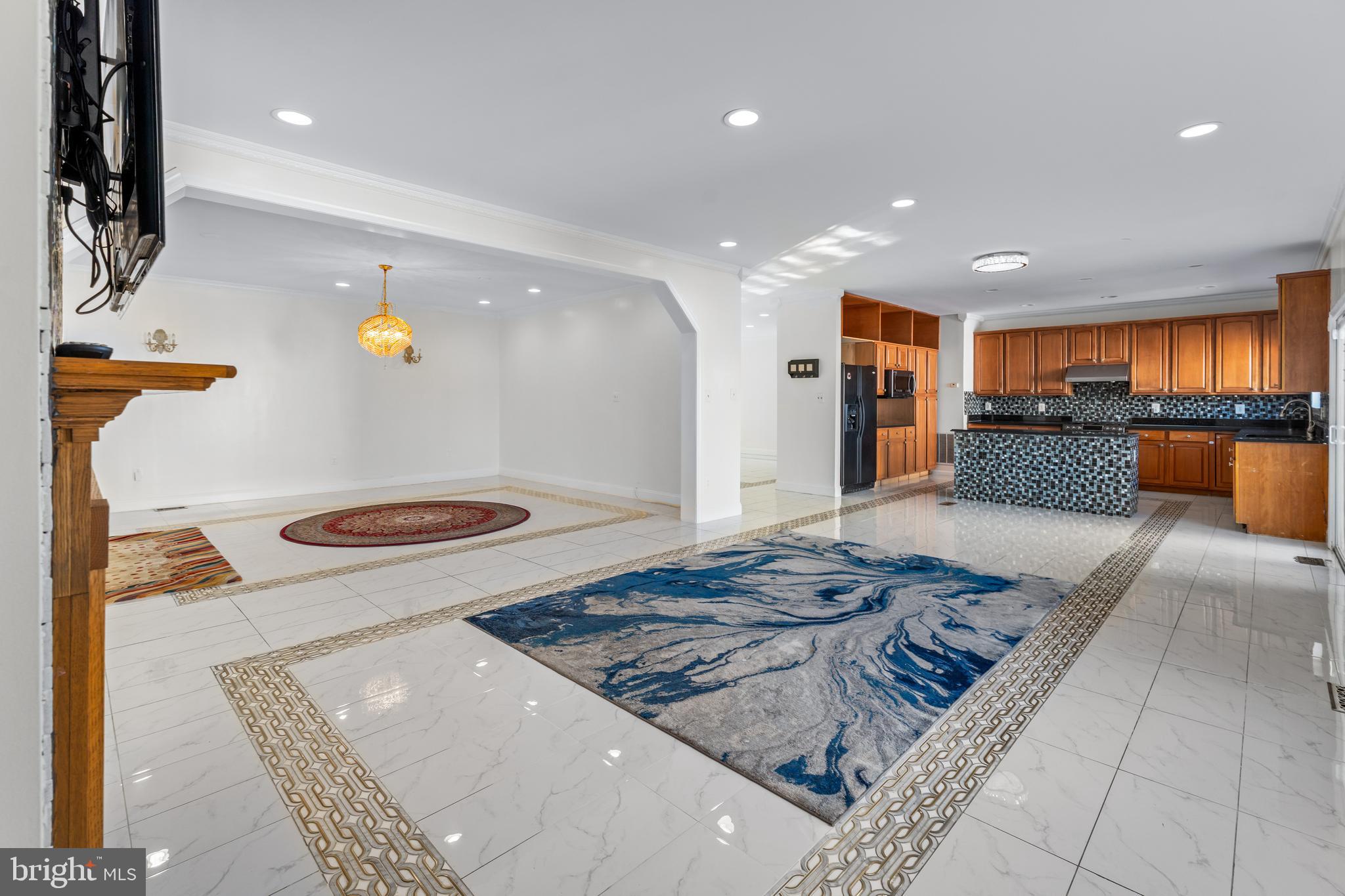 7510 Gilley Terrace Rosedale, MD 21237 - Photo 20 of 46 a kitchen with stainless steel appliances granite countertop a sink stove and cabinets