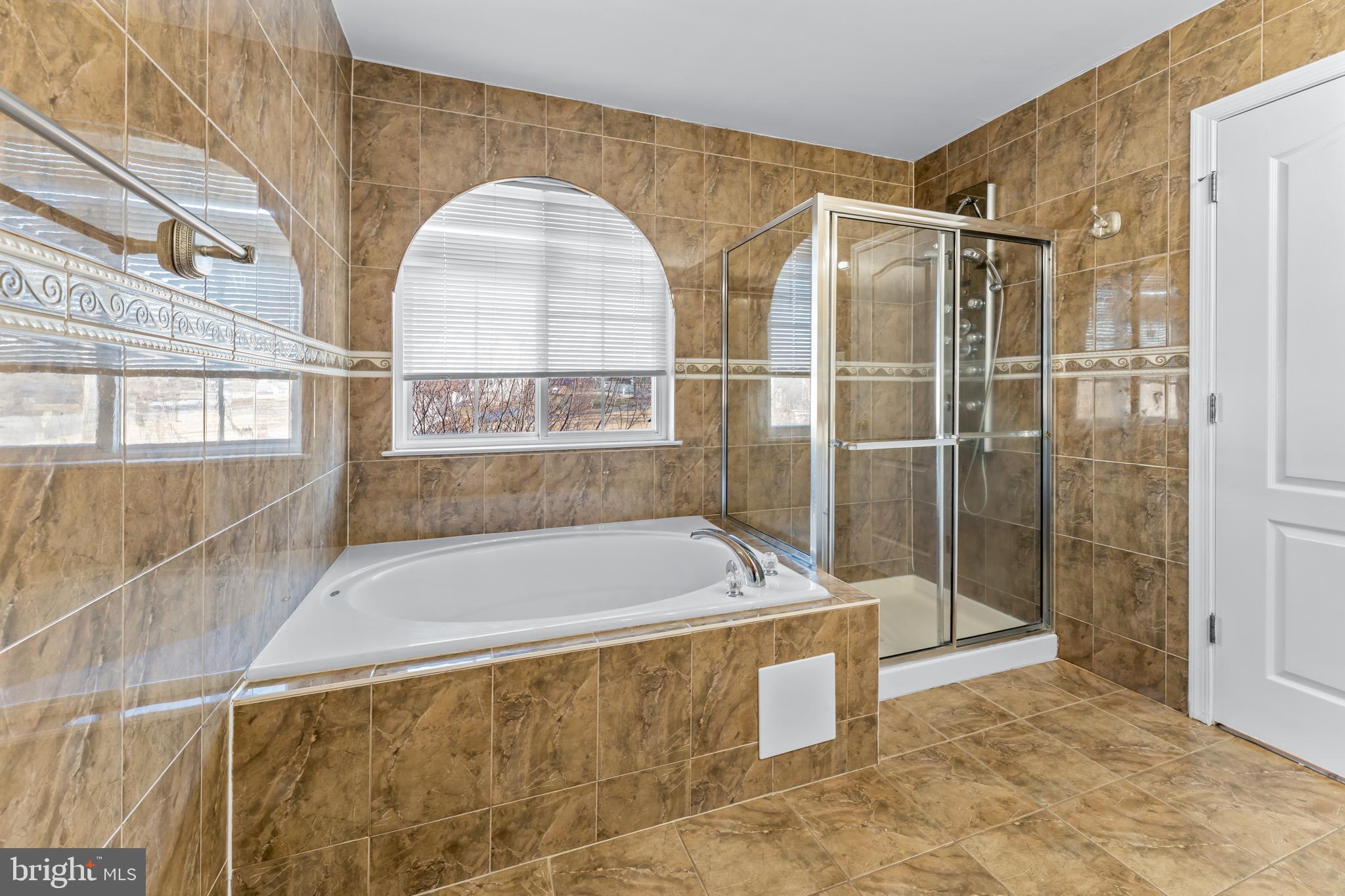 7510 Gilley Terrace Rosedale, MD 21237 - Photo 28 of 46 a bath tub sitting next to a window