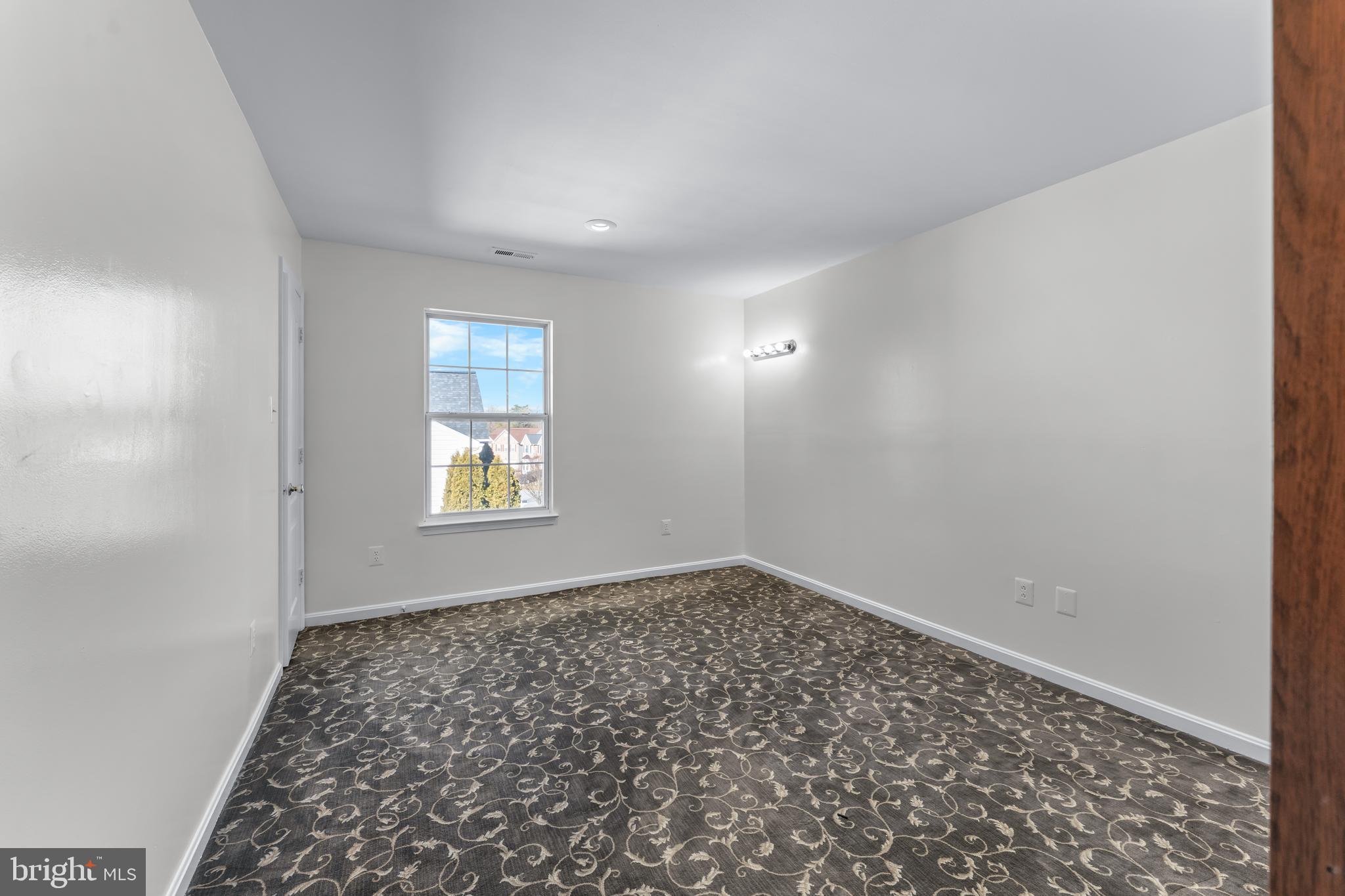 7510 Gilley Terrace Rosedale, MD 21237 - Photo 29 of 46 a view of a room that has a window in it
