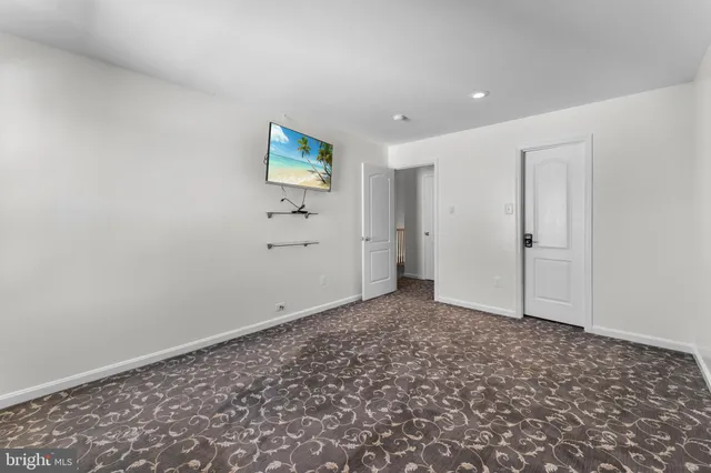 a room with furniture and wooden floor